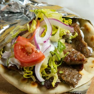 Classic Gyro. (Lettuce, Tomatoes, Onions, & Tzatziki Sauce)