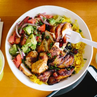 Casado Bowl. (Rice, Black Beans, Plantains, Avocado Salad, & Cilantro Tahini Sauce)