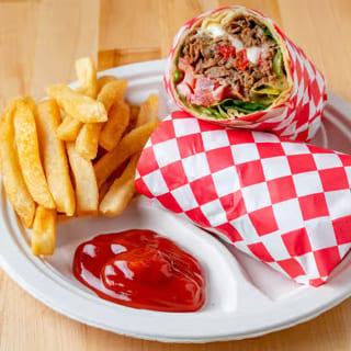 Philly Cheesesteak Wrap. (Grilled Onions, Roasted Peppers, Lettuce, Tomatoes, Provolone,  & Mayo)