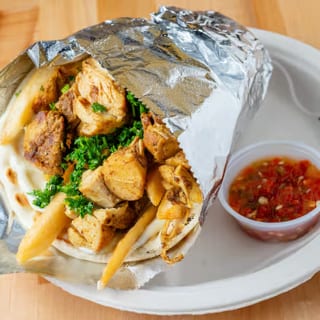 Chicken Gyro Platter. (Pita Bread, Greek Salad, Tzatziki Sauce, & Choice of Side)